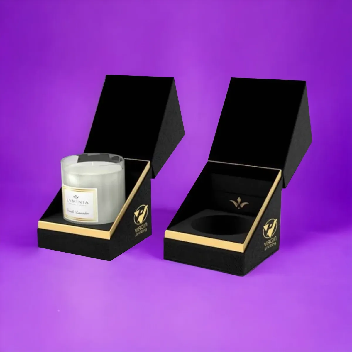 Black rigid candle boxes with gold foil detail and a glass candle