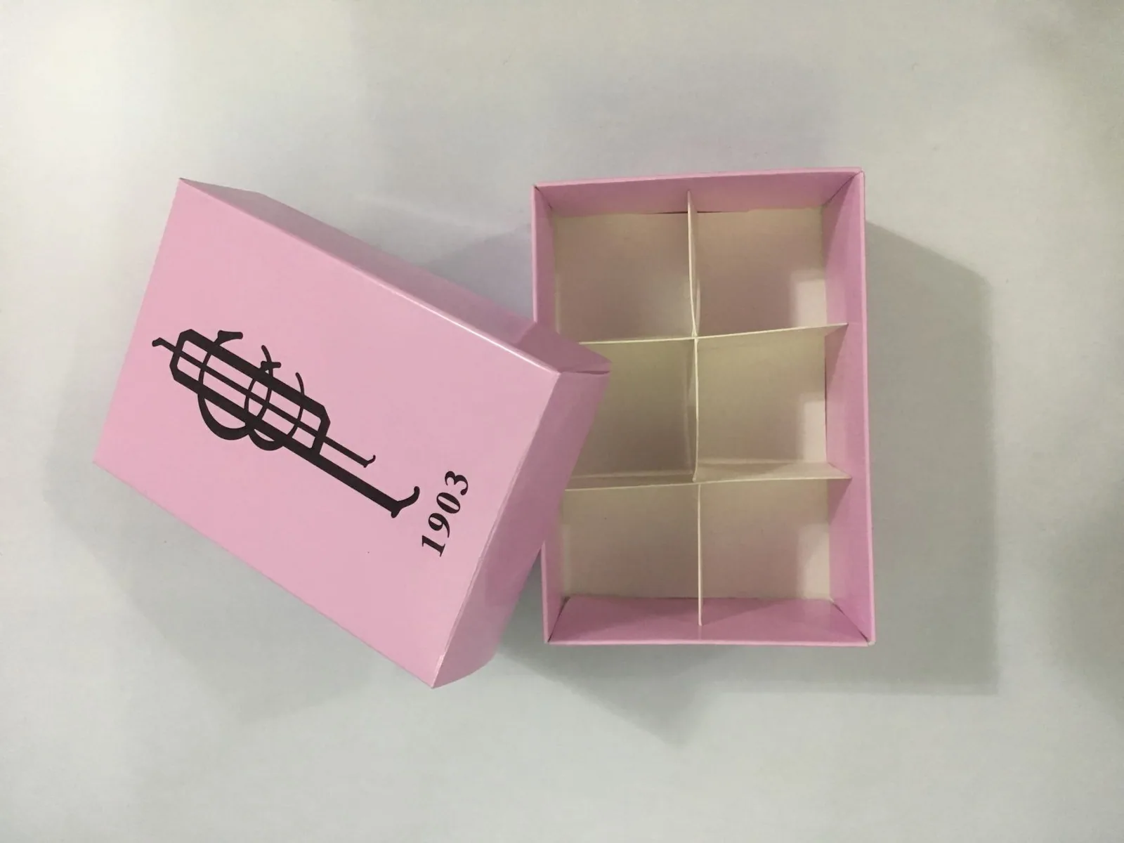 Pink two-piece box with a six-cell divider