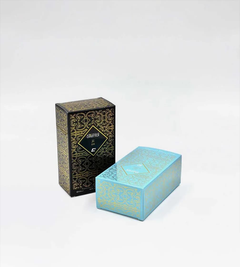 Black perfume carton with all-over gold foil