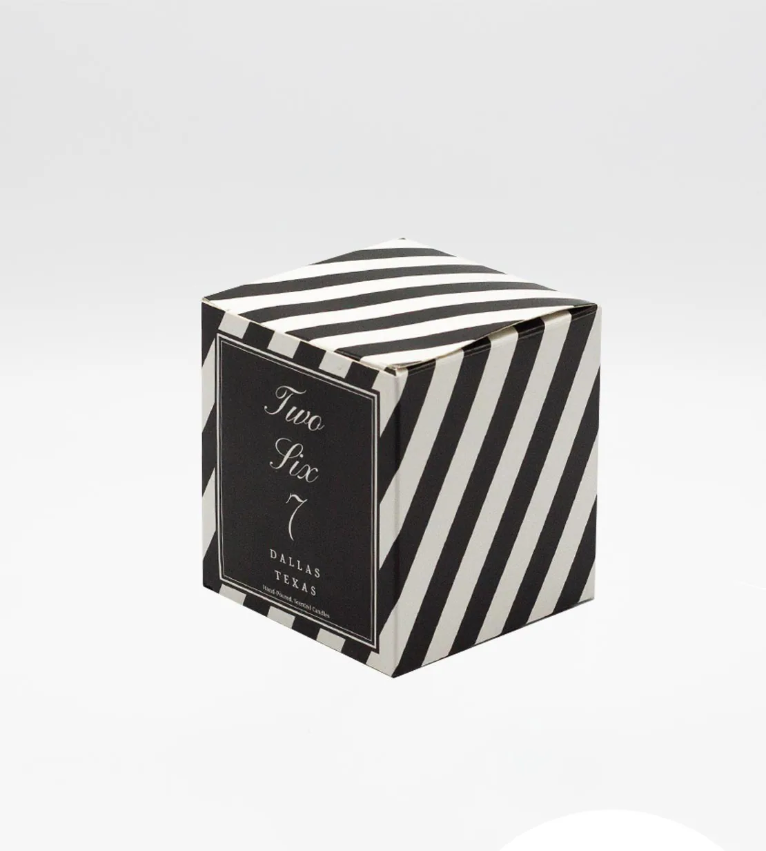 Striped cube carton for a candle