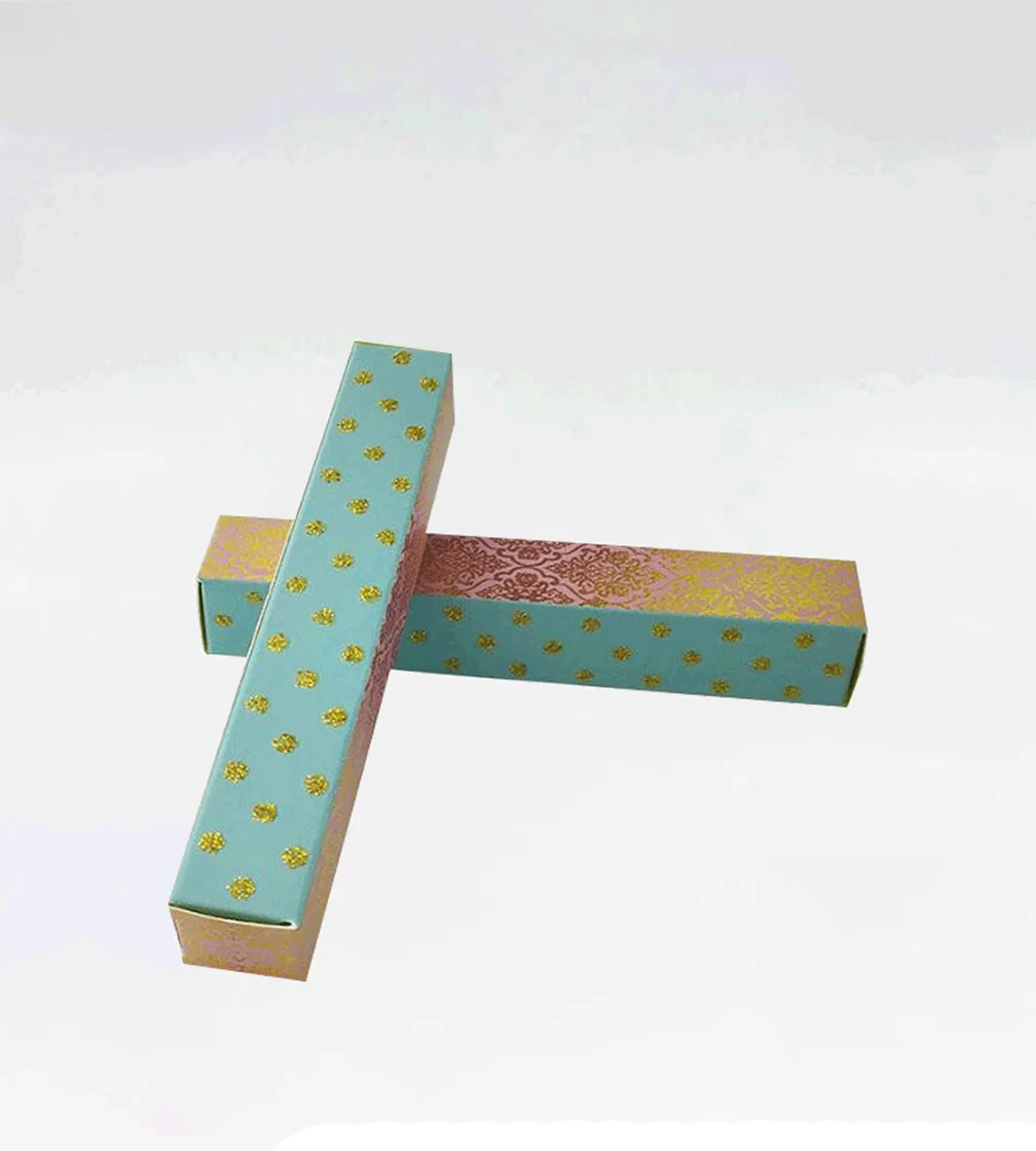 Slim mint cartons with gold foil dots