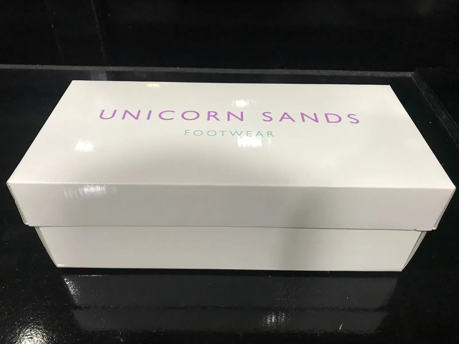 Glossy white two-piece shoe box