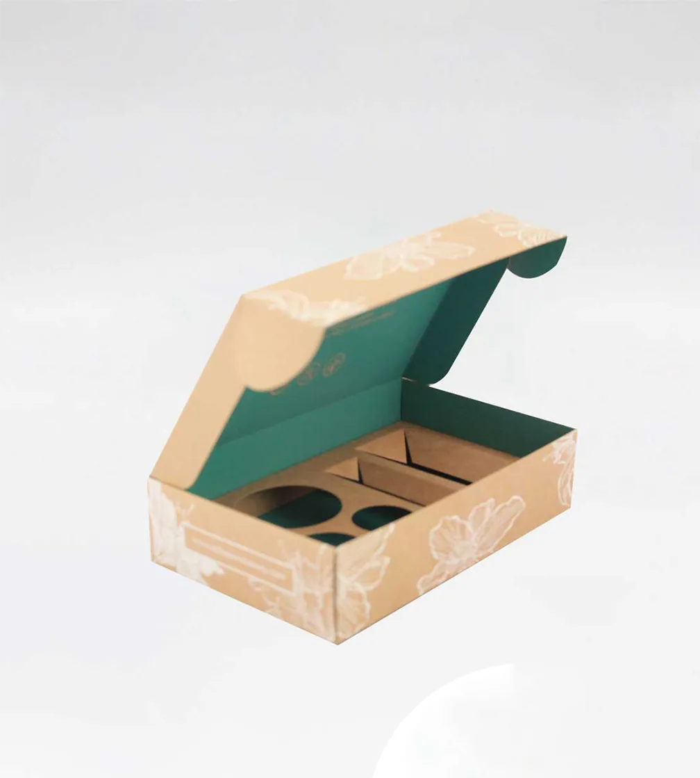 Floral mailer with a teal interior and die-cut insert