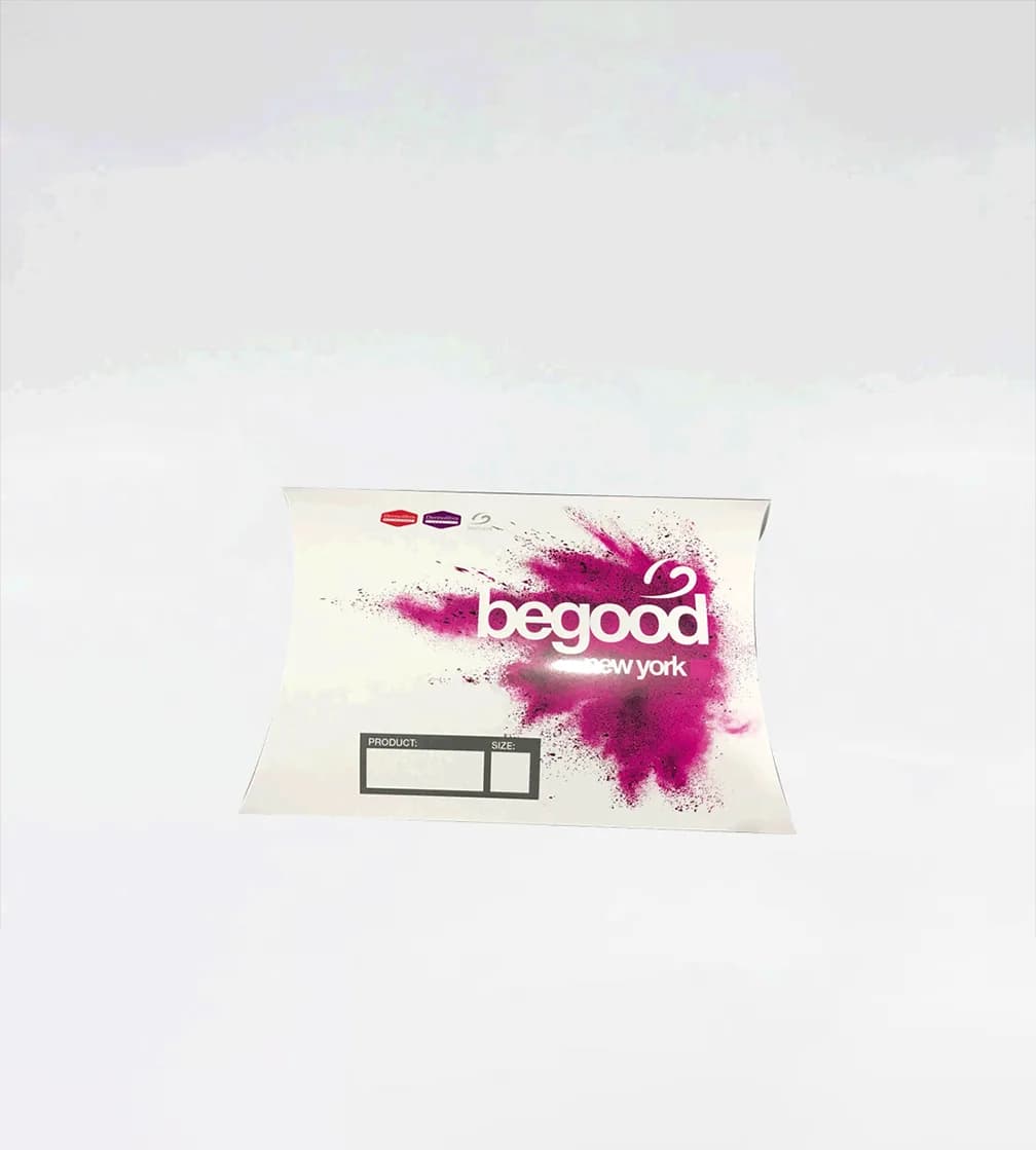 White pillow box with a magenta splash