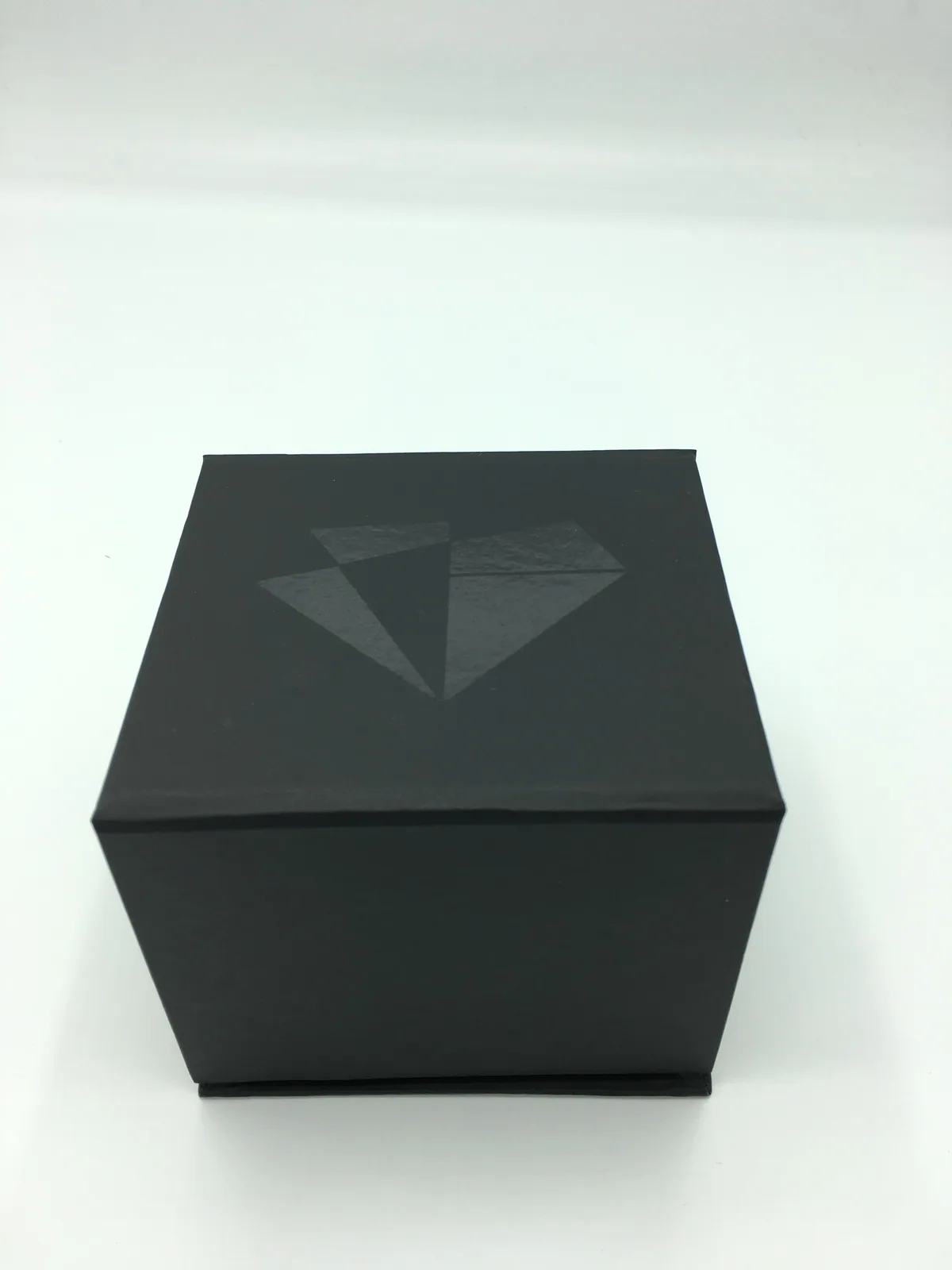 Black cube rigid box with spot-UV mark