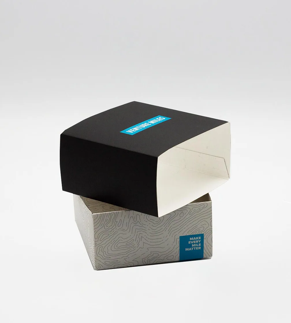 Black lid with label on a gray base
