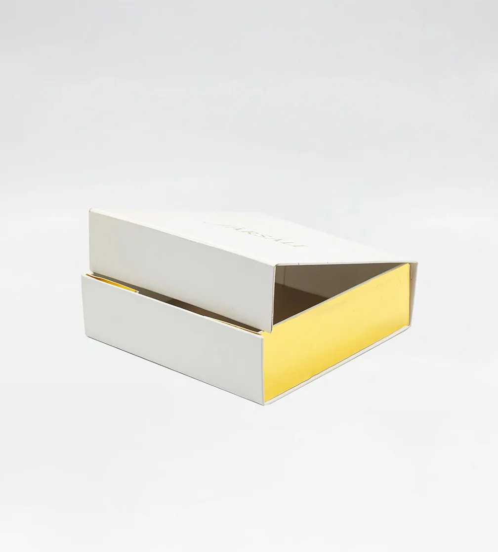 White two-piece box with metallic gold interior